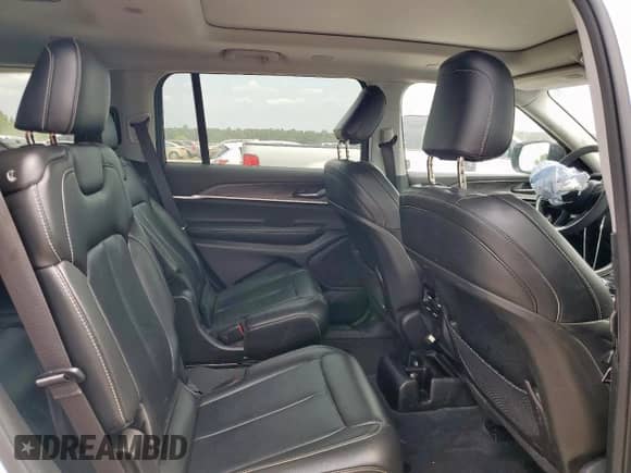 2023 Jeep Grand Cherokee Limited z VIN 1C4RJKBG7P8736049, wystawiony jako Copart lot #67277525 z przebiegiem 52 516 mil mil oraz Szkoda całkowita • Salvage title. Historia ofert i sprzedaży dostępna na DreamBid. Obrazek 11.