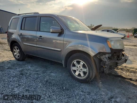 2009 Honda Pilot Touring with VIN 5FNYF38829B016406, listed as a Copart auction lot 71791575 with 221,923 mi miles and Salvage title. Bid and sale history available at DreamBid. Image 4.