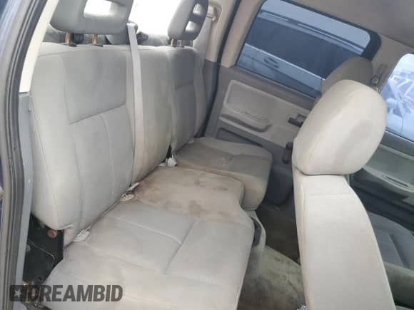 2006 Dodge Dakota ST z VIN 1D7HW28N46S517804, wystawiony jako Copart lot #83544284 z przebiegiem Nie podano mil oraz Szkoda całkowita • Salvage title. Historia ofert i sprzedaży dostępna na DreamBid. Obrazek 10.