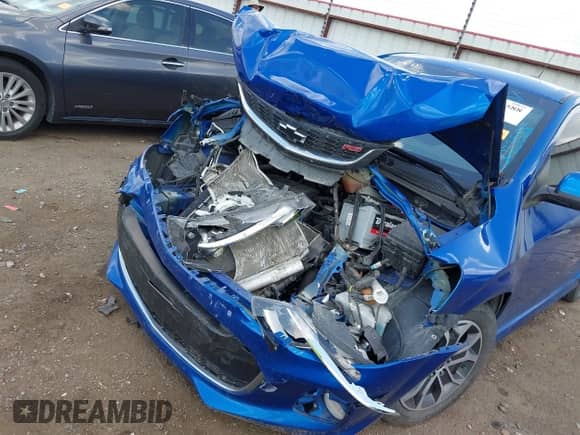 2020 Chevrolet Sonic LT with VIN 1G1JD5SB1L4104295, listed as a IAAI auction lot 43033588 with 83,954 mi miles and . Bid and sale history available at DreamBid. Image 6.