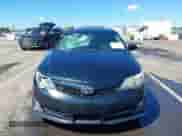 2014 Toyota Camry SE with VIN 4T1BF1FK3EU386026, listed as a IAAI auction lot 43245647 with 141,769 mi miles and . Bid and sale history available at DreamBid. Image 6.