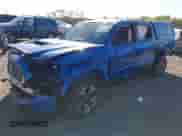 2018 Toyota Tacoma SR z VIN 3TMCZ5AN6JM157248, wystawiony jako IAAI lot #43500126 z przebiegiem 91 765 mil mil oraz . Historia ofert i sprzedaży dostępna na DreamBid. Obrazek 2.