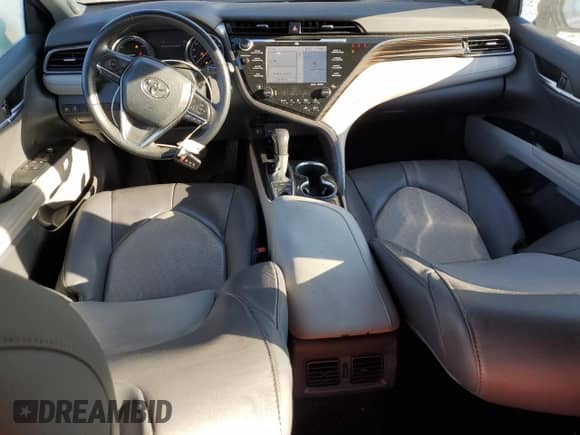 2020 Toyota Camry Hybrid XLE with VIN 4T1F31AK7LU525329, listed as a Copart auction lot 75832114 with 76,763 mi miles and Salvage title. Bid and sale history available at DreamBid. Image 8.