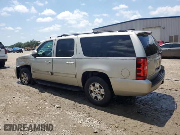 2014 Chevrolet Suburban LT with VIN 1GNSCJE06ER193781, listed as a Copart auction lot 56224305 with 154,297 mi miles and Salvage title. Bid and sale history available at DreamBid. Image 2.