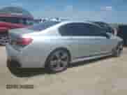 2016 BMW 7 Series 750i xDrive с VIN WBA7F2C59GG417311, выставлен на аукционе Copart как лот 61777655 с пробегом 103 374 миль миль и Списание • Salvage title. История ставок и продаж доступна на DreamBid. Изображение 3.