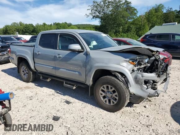 2019 Toyota Tacoma TRD Off Road z VIN 3TMCZ5ANXKM250954, wystawiony jako Copart lot #65703125 z przebiegiem 53 473 mil mil oraz Szkoda całkowita • Salvage title. Historia ofert i sprzedaży dostępna na DreamBid. Obrazek 4.