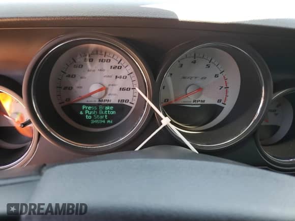 2008 Dodge Challenger SRT-8 z VIN 2B3LJ74W18H289514, wystawiony jako Copart lot #53910765 z przebiegiem 34 594 mil mil oraz Szkoda całkowita • Salvage title. Historia ofert i sprzedaży dostępna na DreamBid. Obrazek 9.