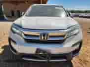 2019 Honda Pilot Touring 8-Passenger z VIN 5FNYF5H96KB015396, wystawiony jako Copart lot #70816345 z przebiegiem 108 095 mil mil oraz Szkoda całkowita • Salvage title. Historia ofert i sprzedaży dostępna na DreamBid. Obrazek 5.