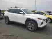 2024 Hyundai Tucson Blue with VIN KM8JBCD1XRU210836, listed as a Copart auction lot 70576955 with 13,043 mi miles and Salvage title. Bid and sale history available at DreamBid. Image 4.