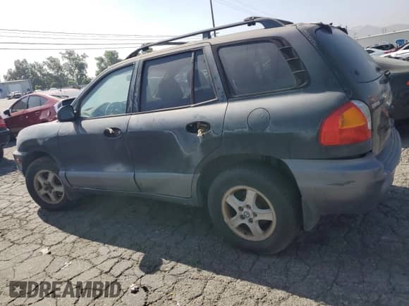 2003 Hyundai Santa Fe GLS z VIN KM8SC13D93U368285, wystawiony jako Copart lot #62008835 z przebiegiem 281 403 mil mil oraz Czysty tytuł • Clean title. Historia ofert i sprzedaży dostępna na DreamBid. Obrazek 2.