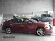 2013 Nissan Maxima S with VIN 1N4AA5AP8DC801960, listed as a IAAI auction lot 43393938 with 113,370 mi miles and . Bid and sale history available at DreamBid. Image 13.