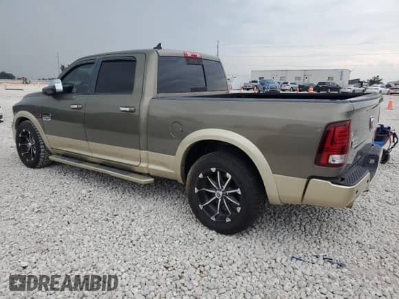 2014 Ram 1500 Longhorn Limited z VIN 1C6RR7WM6ES423250, wystawiony jako Copart lot #69193804 z przebiegiem 148 863 mil mil oraz Szkoda całkowita • Salvage title. Historia ofert i sprzedaży dostępna na DreamBid. Obrazek 2.