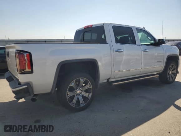 2016 GMC Sierra 1500 Denali z VIN 3GTU2PEJ2GG371785, wystawiony jako Copart lot #81668355 z przebiegiem 82 938 mil mil oraz Szkoda całkowita • Salvage title. Historia ofert i sprzedaży dostępna na DreamBid. Obrazek 3.