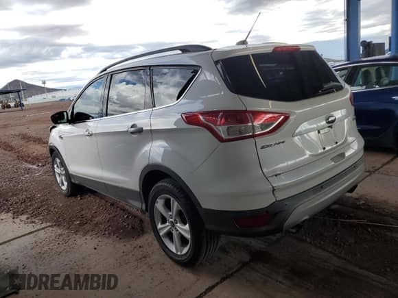 2014 Ford Escape SE z VIN 1FMCU0G92EUB31870, wystawiony jako Copart lot #81413275 z przebiegiem 78 943 mil mil oraz Szkoda całkowita • Salvage title. Historia ofert i sprzedaży dostępna na DreamBid. Obrazek 2.