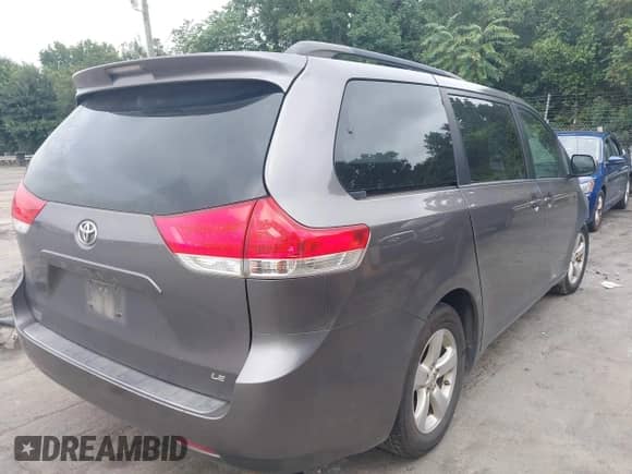 2014 Toyota Sienna LE AAS with VIN 5TDKK3DC2ES459012, listed as a IAAI auction lot 43038989 with 330,758 mi miles and . Bid and sale history available at DreamBid. Image 4.
