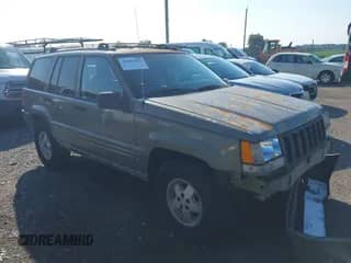 1997 Jeep Grand Cherokee Limited с VIN 1J4GZ78Y5VC613495, выставлен на аукционе IAAI как лот 42823223 с пробегом 217 610 миль миль и . История ставок и продаж доступна на DreamBid. Изображение 1.