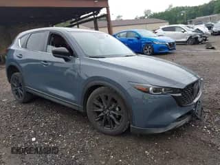 2023 Mazda CX-5 S Preferred z VIN JM3KFBCM8P0281595, wystawiony jako IAAI lot #42633863 z przebiegiem 26 513 mil mil oraz . Historia ofert i sprzedaży dostępna na DreamBid. Obrazek 1.