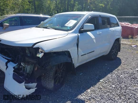 2020 Jeep Grand Cherokee Altitude with VIN 1C4RJFAG2LC337162, listed as a IAAI auction lot 43186271 with 107,697 mi miles and . Bid and sale history available at DreamBid. Image 2.