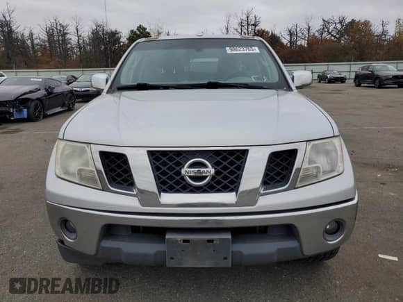 2011 Nissan Frontier Pro-4X z VIN 1N6AD0EVXBC416696, wystawiony jako Copart lot #90623765 z przebiegiem 161 124 mil mil oraz Szkoda całkowita • Salvage title. Historia ofert i sprzedaży dostępna na DreamBid. Obrazek 5.
