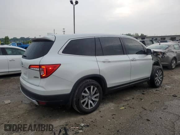 2022 Honda Pilot EX-L with VIN 5FNYF6H57NB033154, listed as a Copart auction lot 63794915 with 40,525 mi miles and Salvage title. Bid and sale history available at DreamBid. Image 3.