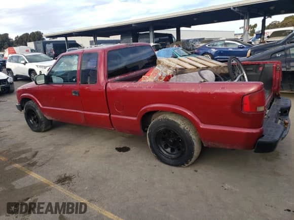 2003 Chevrolet S-10 LS with VIN 1GCCS19H438218647, listed as a Copart auction lot 87681665 with 167,032 mi miles and Salvage title. Bid and sale history available at DreamBid. Image 2.