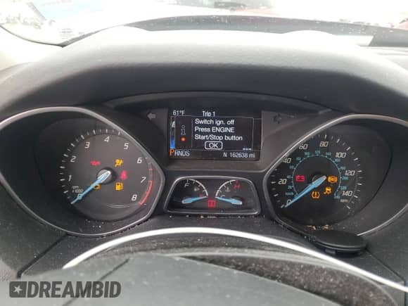 2014 Ford Focus Titanium z VIN 1FADP3N21EL192484, wystawiony jako Copart lot #86443235 z przebiegiem 162 638 mil mil oraz Nie do naprawy • Non repairable. Historia ofert i sprzedaży dostępna na DreamBid. Obrazek 9.