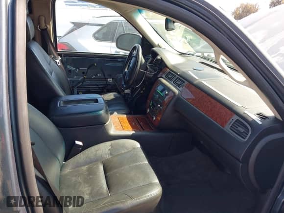 2008 Chevrolet Tahoe LTZ with VIN 1GNFC13JX8J216303, listed as a IAAI auction lot 42287728 with 152,012 mi miles and . Bid and sale history available at DreamBid. Image 5.
