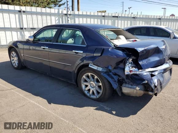 2005 Chrysler 300 C with VIN 2C3JA63H85H679092, listed as a Copart auction lot 70284705 with 191,335 mi miles and Salvage title. Bid and sale history available at DreamBid. Image 2.