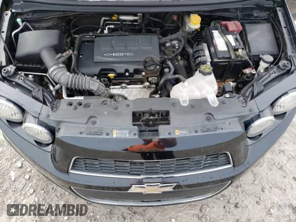 2012 Chevrolet Sonic LT with VIN 1G1JD6SB7C4184692, listed as a Copart auction lot 50142405 with 126,481 mi miles and Salvage title. Bid and sale history available at DreamBid. Image 14.