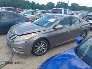 2012 Hyundai Azera z VIN KMHFH4JGXCA180863, wystawiony jako IAAI lot #42735387 z przebiegiem 163 190 mil mil oraz . Historia ofert i sprzedaży dostępna na DreamBid. Obrazek 2.