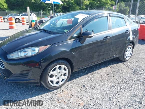 2015 Ford Fiesta SE z VIN 3FADP4BE2FM132430, wystawiony jako IAAI lot #42451462 z przebiegiem 73 501 mil mil oraz . Historia ofert i sprzedaży dostępna na DreamBid. Obrazek 2.