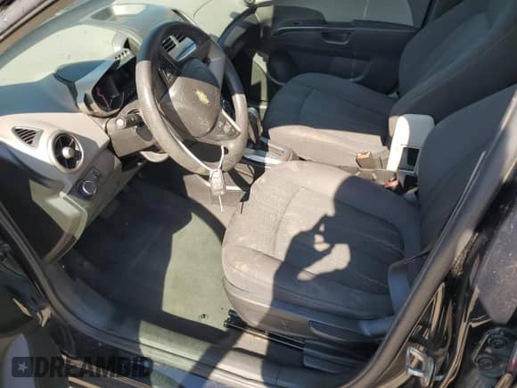 2014 Chevrolet Sonic LT с VIN 1G1JC6SB4E4156354, выставлен на аукционе Copart как лот 80877815 с пробегом 109 509 миль миль и Списание • Salvage title. История ставок и продаж доступна на DreamBid. Изображение 7.