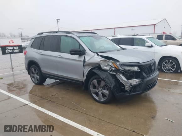 2021 Honda Passport Touring z VIN 5FNYF8H9XMB019732, wystawiony jako IAAI lot #41459208 z przebiegiem 41 745 mil mil oraz . Historia ofert i sprzedaży dostępna na DreamBid. Obrazek 1.