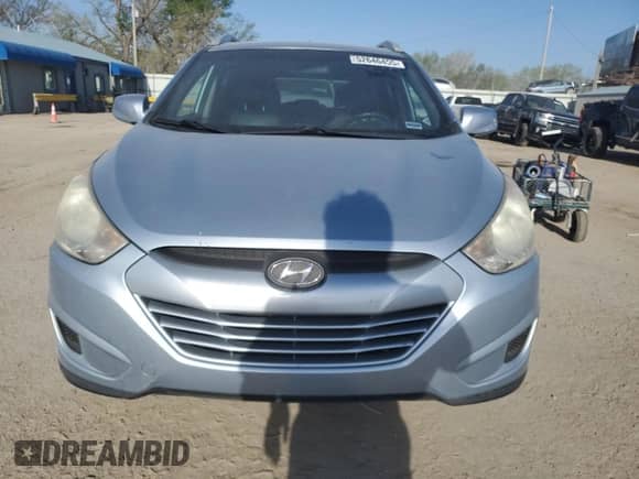 2011 Hyundai Tucson Limited with VIN KM8JU3AC7BU213263, listed as a Copart auction lot 52646455 with 165,236 mi miles and Salvage title. Bid and sale history available at DreamBid. Image 5.
