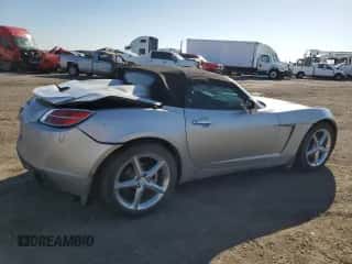 2009 Saturn Sky with VIN 1G8MB35B29Y104280, listed as a Copart auction lot 48437935 with 142,472 mi miles and Salvage title. Bid and sale history available at DreamBid. Image 3.