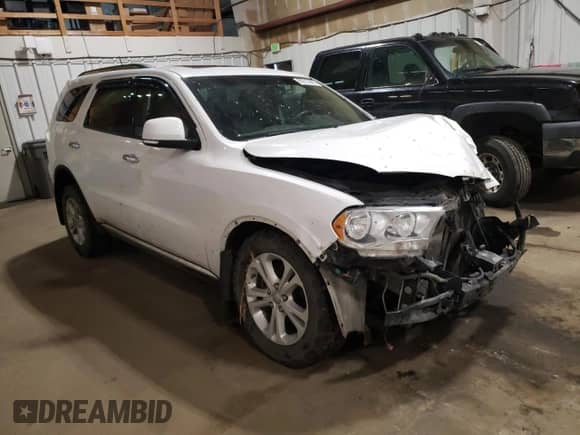 2013 Dodge Durango Crew with VIN 1C4RDJDG9DC554196, listed as a Copart auction lot 80313895 with 104,486 mi miles and Salvage title. Bid and sale history available at DreamBid. Image 4.