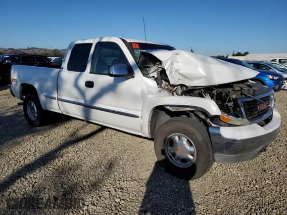 2001 GMC Sierra 1500 SLE z VIN 1GTEK19T01E336805, wystawiony jako Copart lot #82631185 z przebiegiem 223 096 mil mil oraz Szkoda całkowita • Salvage title. Historia ofert i sprzedaży dostępna na DreamBid. Obrazek 4.