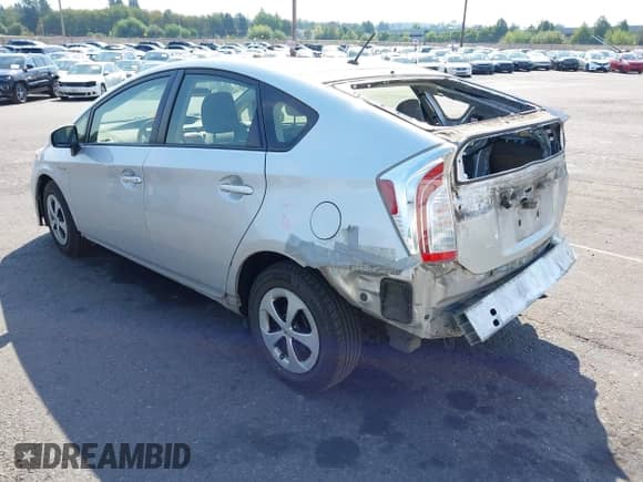 2015 Toyota Prius Two with VIN JTDKN3DUXF1984513, listed as a IAAI auction lot 43105789 with 109,652 mi miles and . Bid and sale history available at DreamBid. Image 3.