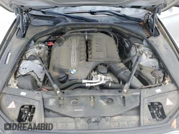 2014 BMW 5 Series 535i z VIN WBA5B1C59ED478170, wystawiony jako Copart lot #70325395 z przebiegiem 142 923 mil mil oraz Szkoda całkowita • Salvage title. Historia ofert i sprzedaży dostępna na DreamBid. Obrazek 11.