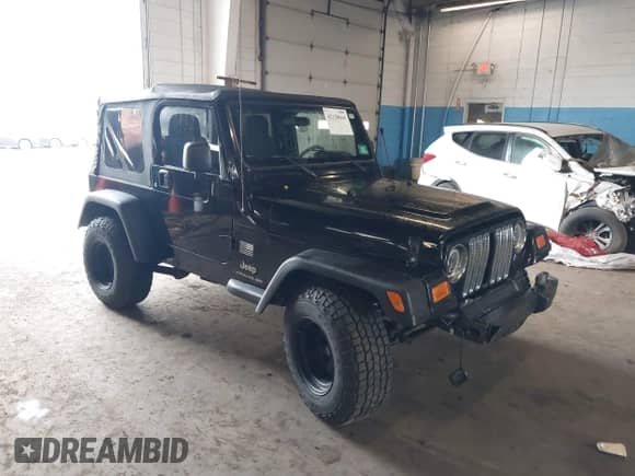 2005 Jeep Wrangler SE z VIN 1J4FA29195P358723, wystawiony jako IAAI lot #42158664 z przebiegiem 126 849 mil mil oraz . Historia ofert i sprzedaży dostępna na DreamBid. Obrazek 1.