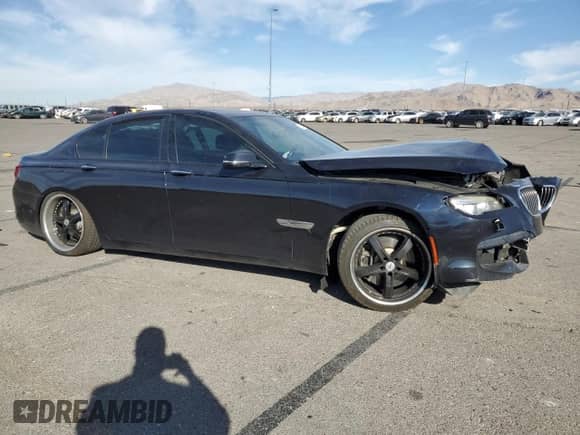 2015 BMW 7 Series 750i with VIN WBAYA8C57FG197624, listed as a Copart auction lot 75291444 with Not provided miles and Salvage title. Bid and sale history available at DreamBid. Image 4.