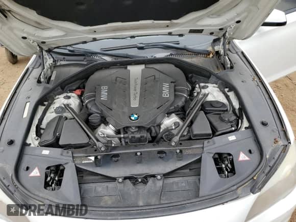 2012 BMW 7 Series 750i xDrive с VIN WBAKC6C5XCC396061, выставлен на аукционе Copart как лот 67393625 с пробегом 108 618 миль миль и Чистый • Clean title. История ставок и продаж доступна на DreamBid. Изображение 11.