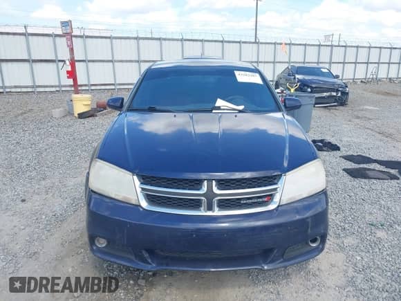 2013 Dodge Avenger SXT with VIN 1C3CDZCBXDN615817, listed as a IAAI auction lot 43282287 with 245,259 mi miles and . Bid and sale history available at DreamBid. Image 12.