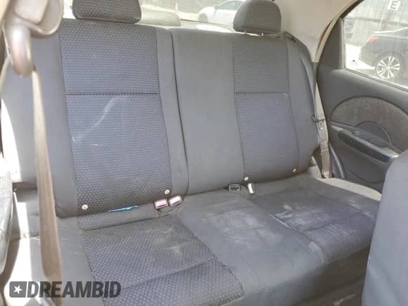 2006 Chevrolet Aveo LS с VIN KL1TD56636B682497, выставлен на аукционе Copart как лот 58052955 с пробегом 236 917 миль миль и Списание • Salvage title. История ставок и продаж доступна на DreamBid. Изображение 10.
