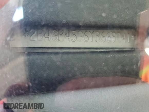 2000 Dodge Caravan SE z VIN 2B4GP45G6YR669041, wystawiony jako Copart lot #56864805 z przebiegiem 143 807 mil mil oraz Szkoda całkowita • Salvage title. Historia ofert i sprzedaży dostępna na DreamBid. Obrazek 14.