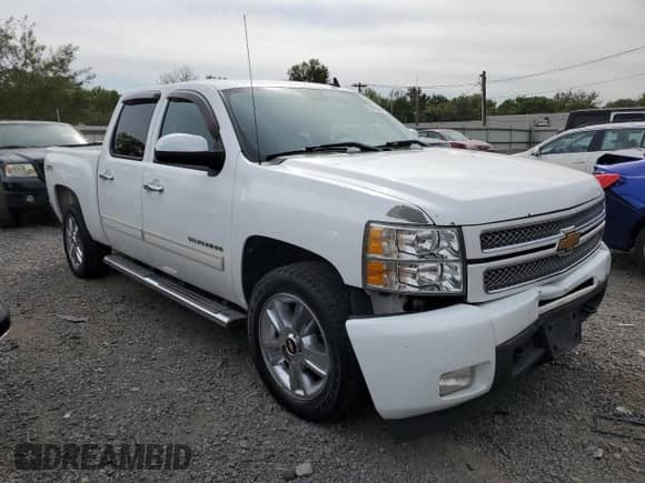 2012 Chevrolet Silverado 1500 LTZ with VIN 1GCPKTE71CF124456, listed as a Copart auction lot 83750495 with 158,377 mi miles and Salvage title. Bid and sale history available at DreamBid. Image 4.