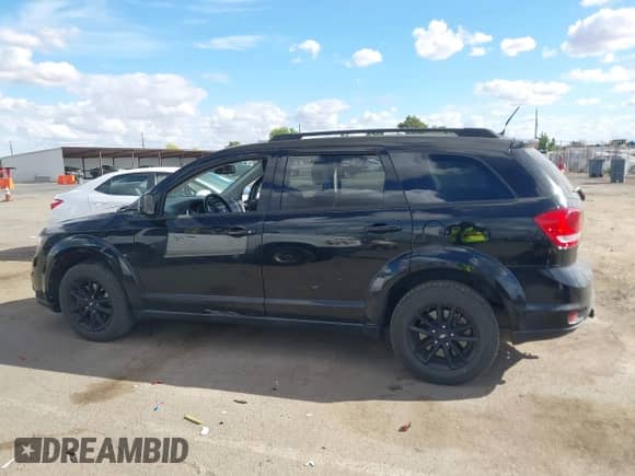 2019 Dodge Journey SE with VIN 3C4PDCBG4KT846023, listed as a IAAI auction lot 43196525 with 88,413 mi miles and . Bid and sale history available at DreamBid. Image 14.