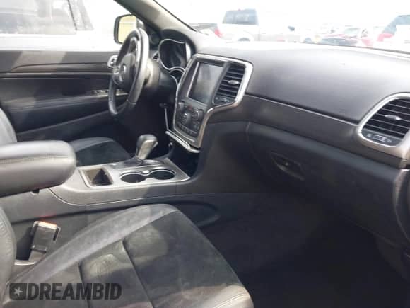 2018 Jeep Grand Cherokee Laredo E with VIN 1C4RJEAG2JC353398, listed as a IAAI auction lot 41846316 with 116,043 mi miles and . Bid and sale history available at DreamBid. Image 5.