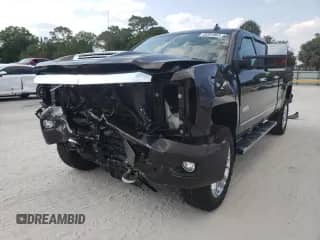 2018 Chevrolet Silverado 2500HD High Country с VIN 1GC1KXEY2JF288673, выставлен на аукционе Copart как лот 45281803 с пробегом Не указан миль и На запчасти • Non repairable. История ставок и продаж доступна на DreamBid. Изображение 1.