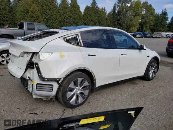 2020 Tesla Model Y Long Range с VIN 5YJYGDEE6LF023427, выставлен на аукционе Copart как лот 81877945 с пробегом 52 307 миль миль и Списание • Salvage title. История ставок и продаж доступна на DreamBid. Изображение 3.
